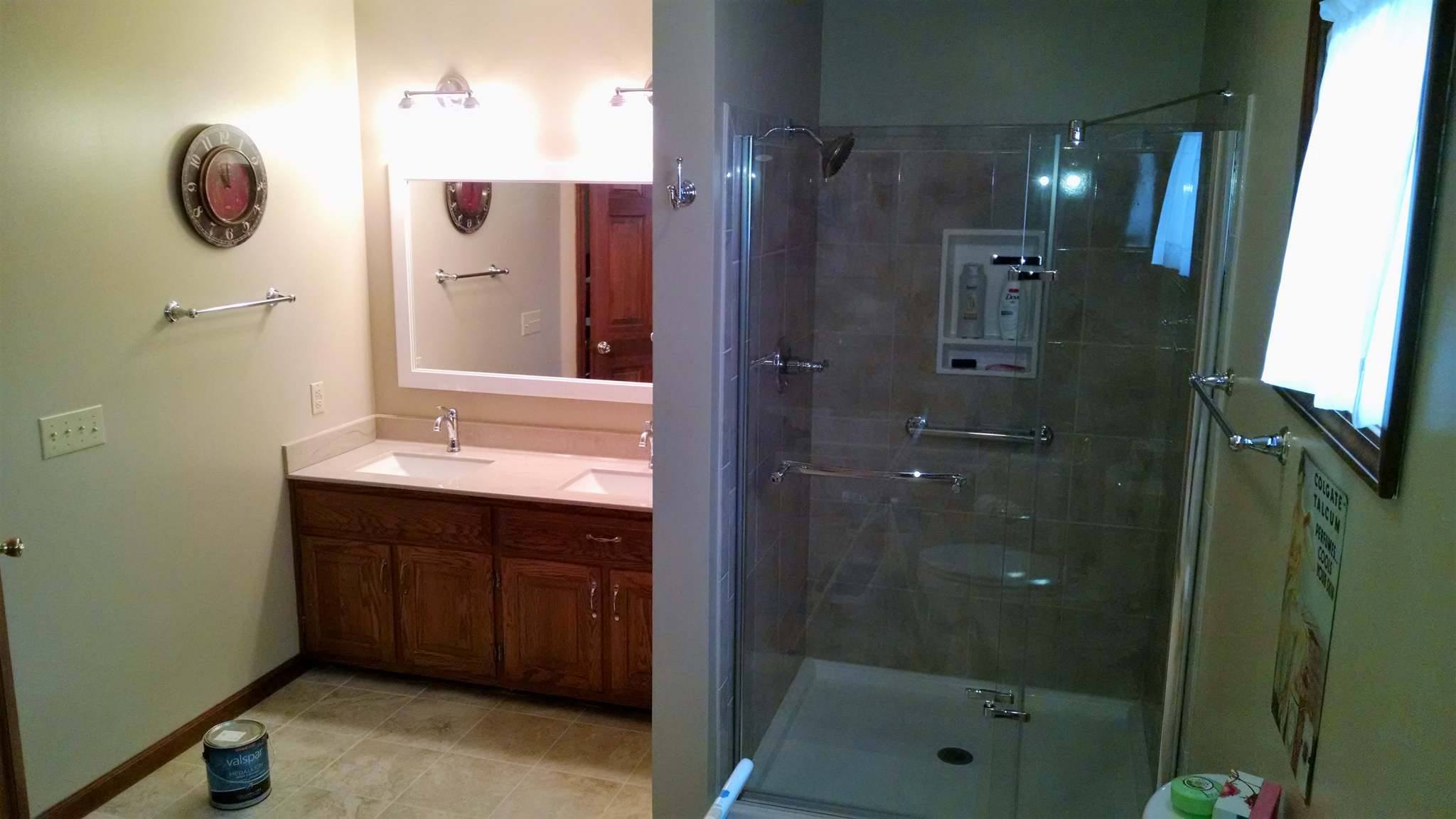 Skelley Construction Inc. - remodeled bathroom with standing shower and jack n jill sinks - Decatur, IL